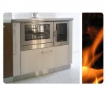 Cucina a legna con scarico fumi laterale e piano cottura in vetroceramica, San Daniele (UD).