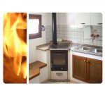 Cucina a legna senza forno disposta ad angolo, color sabbia. Installata a Casiacco (PN).